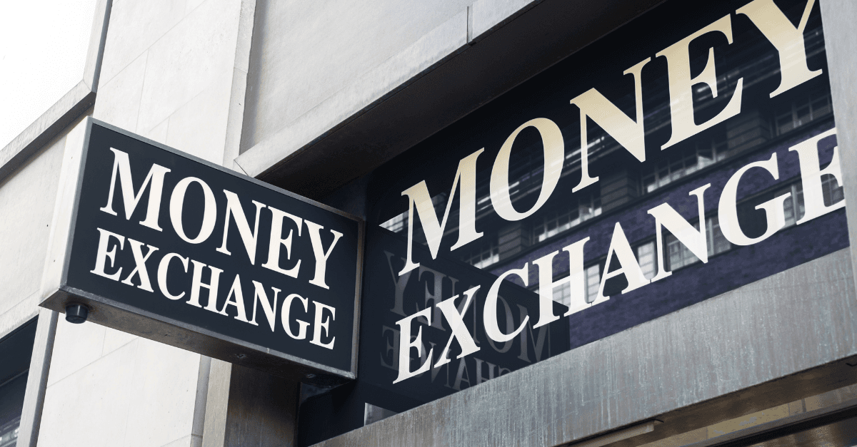 Money exchange storefront signage, illustrating the GCC exchange house sector and rising correspondent banking costs