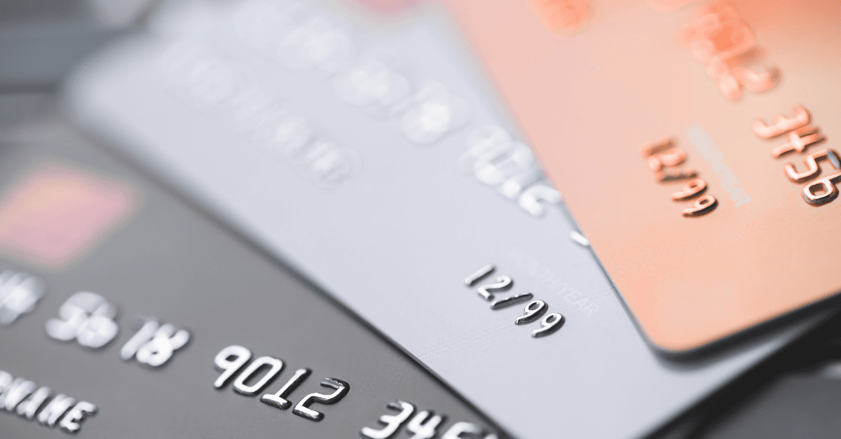 Bank payment cards close-up representing the layered costs of SWIFT transfers for GCC businesses